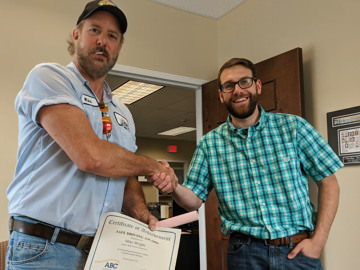 L. Wright receiving an award